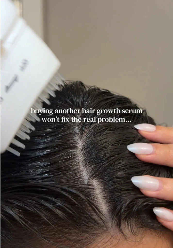Brush-tip serum being applied directly to a hair part