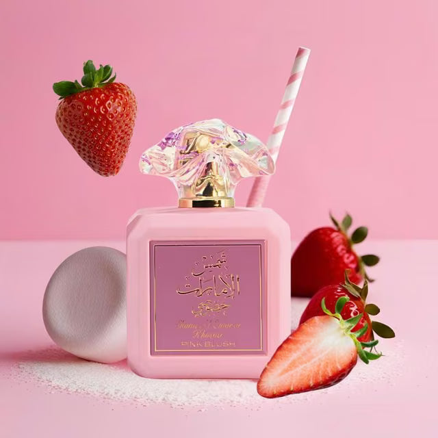 Pink Blush perfume in a strawberry scene