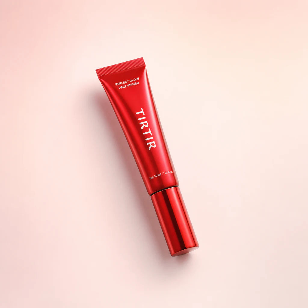 Three-quarter product view of the complete red Reflect Glow Prep Primer tube