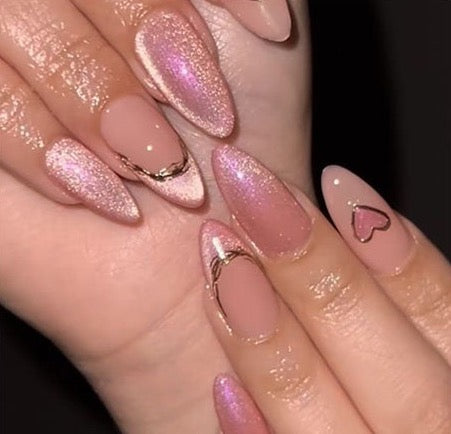 Pink shimmer manicure finish reference on a real hand