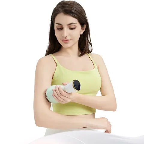 Person holding the compact handheld massager