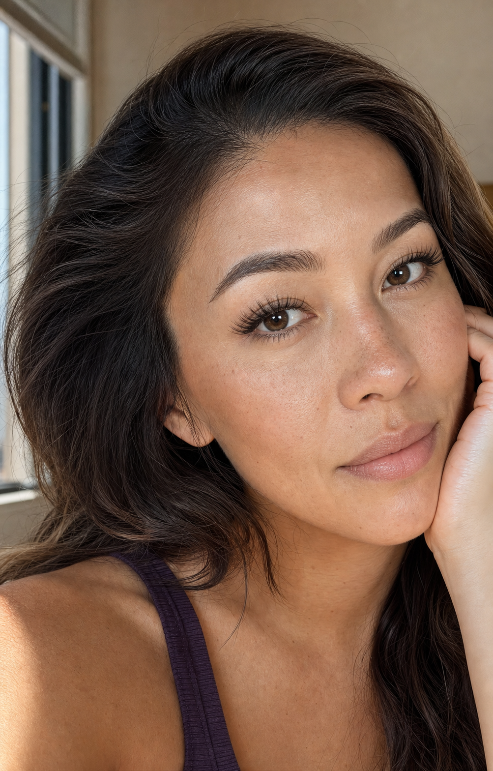 Model wearing soft fluffy lash clusters